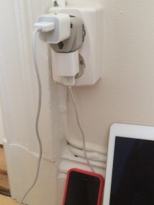 Universal travel adapter charging phone and iPad