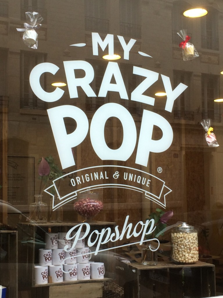 Popcorn store window reading "my crazy pop"