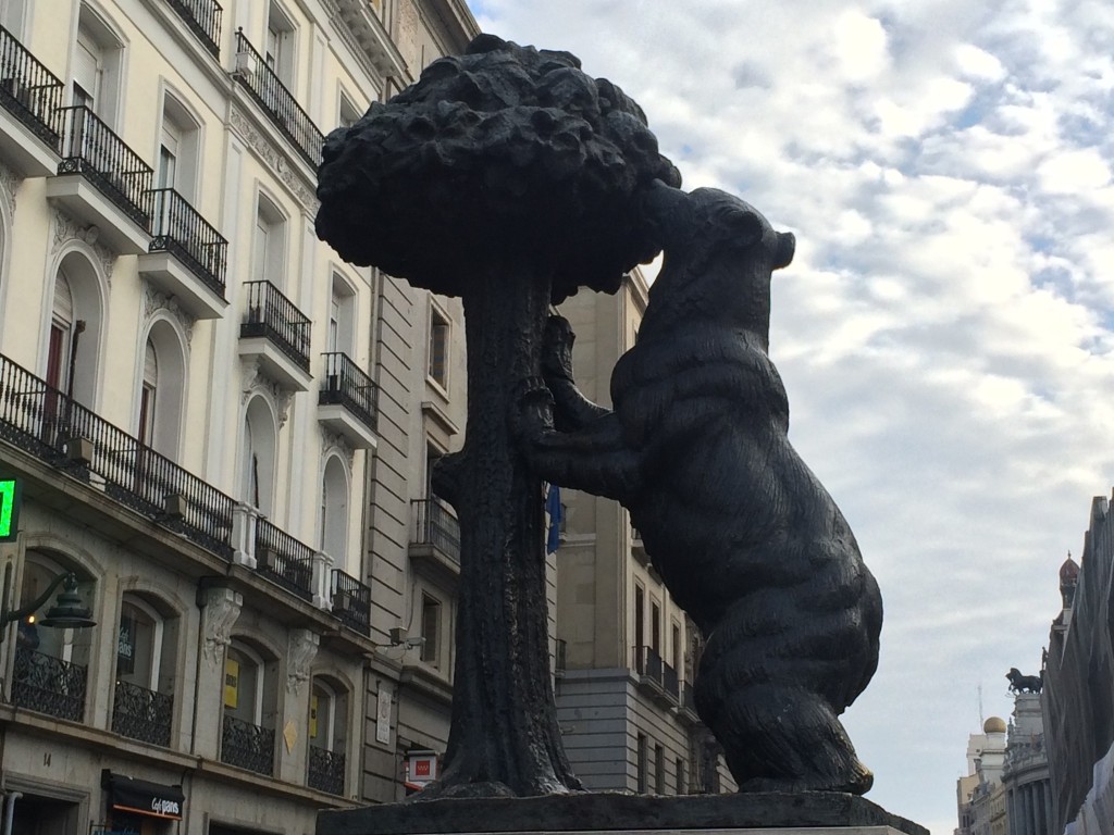 This bear trying to eat strawberries from a tree is a symbol of the city.  J'approve, even though strawberries don't grow on trees.